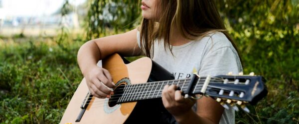 music therapy | girl playing guitar